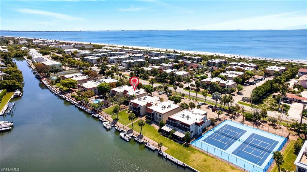 Image 2: Canal-front property with community boat docks and direct water access