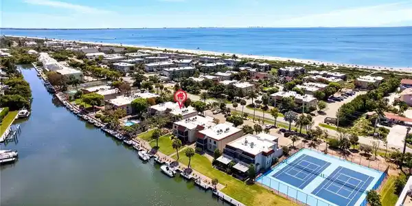 Image 2: Canal-front property with community boat docks and direct water access