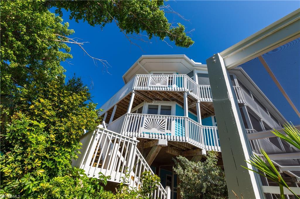 Image 2: Wrap around decks on two levels. Great for maintenance.