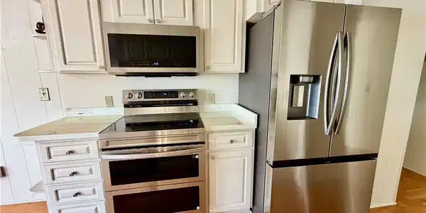 Image 3: Kitchen with new Samsung appliances