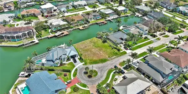 Image 4: Aerial view with a residential view and a water view
