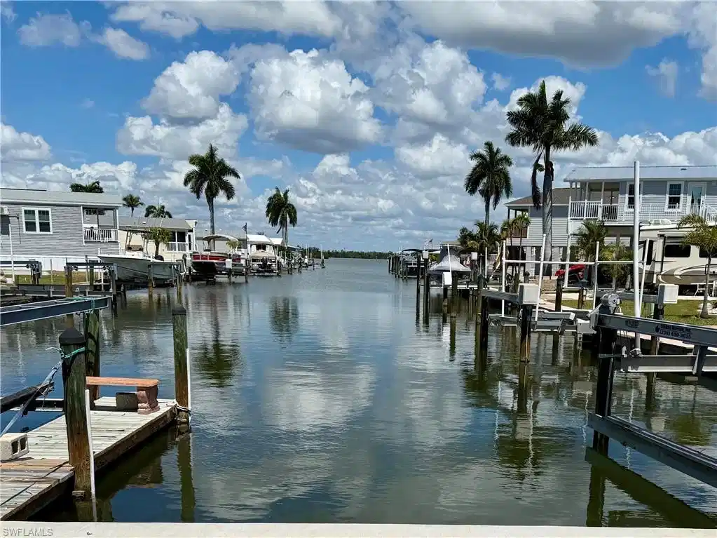 Image 1: Enjoy your Long Canal View leading to the Estero Bay