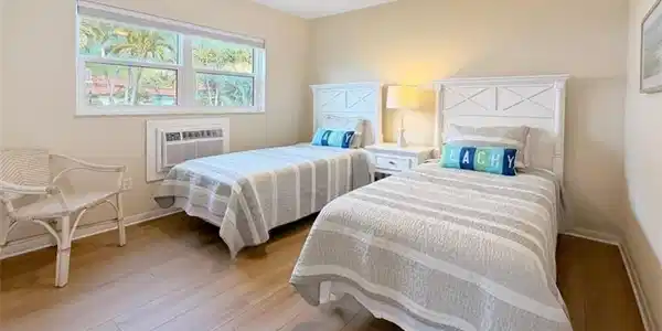 Image 3: Bedroom with light wood-type flooring and ceiling fan
