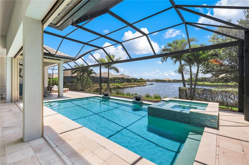 Image 3: Inviting pool and spa with long lake view