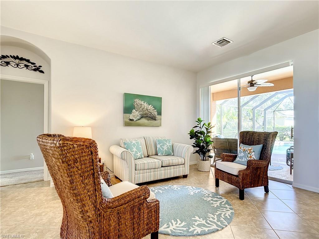 Image 4: Great room with sliding doors.