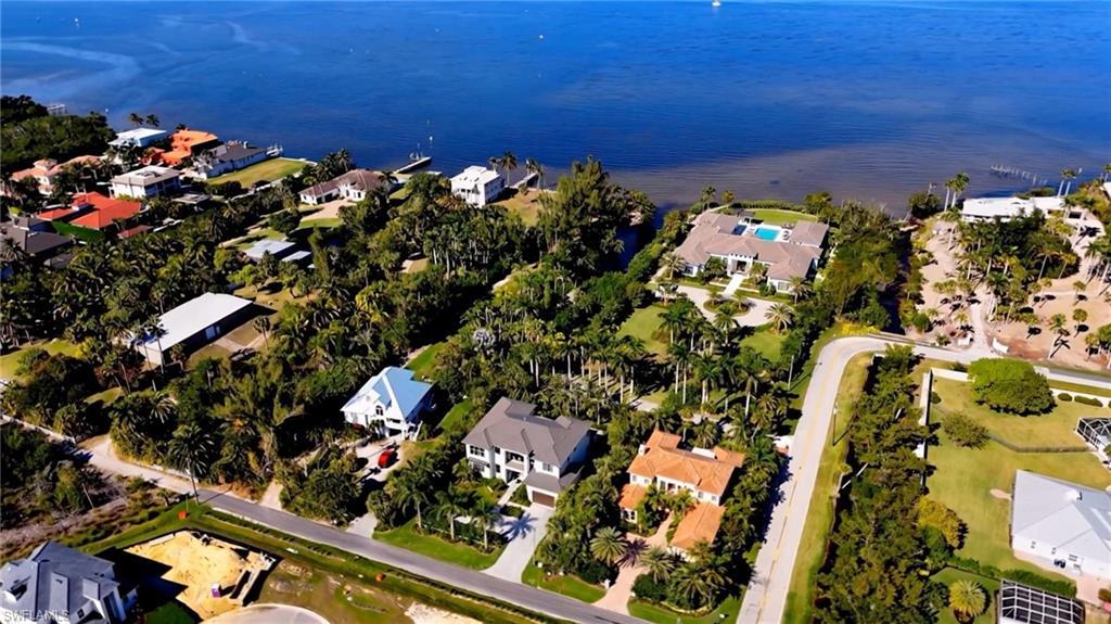 Image 2: This image is an AI-generated conceptual rendering and is not an accurate depiction of the property. Improvements shown may not reflect actual boundaries, setbacks, scale, or permitted uses. Buyer to independently verify all development potential.