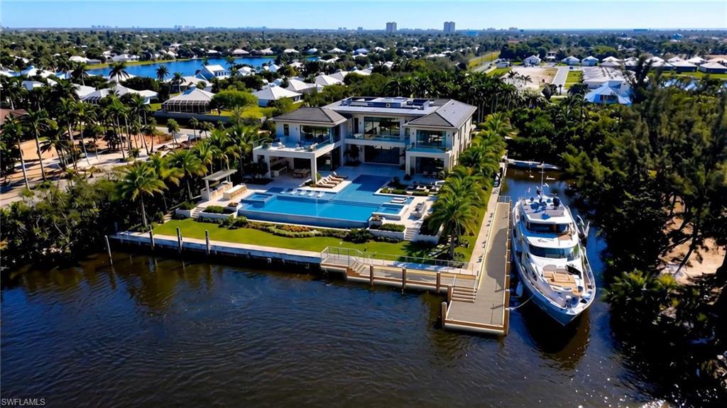 Image 3: This image is an AI-generated conceptual rendering and is not an accurate depiction of the property. Improvements shown may not reflect actual boundaries, setbacks, scale, or permitted uses. Buyer to independently verify all development potential.