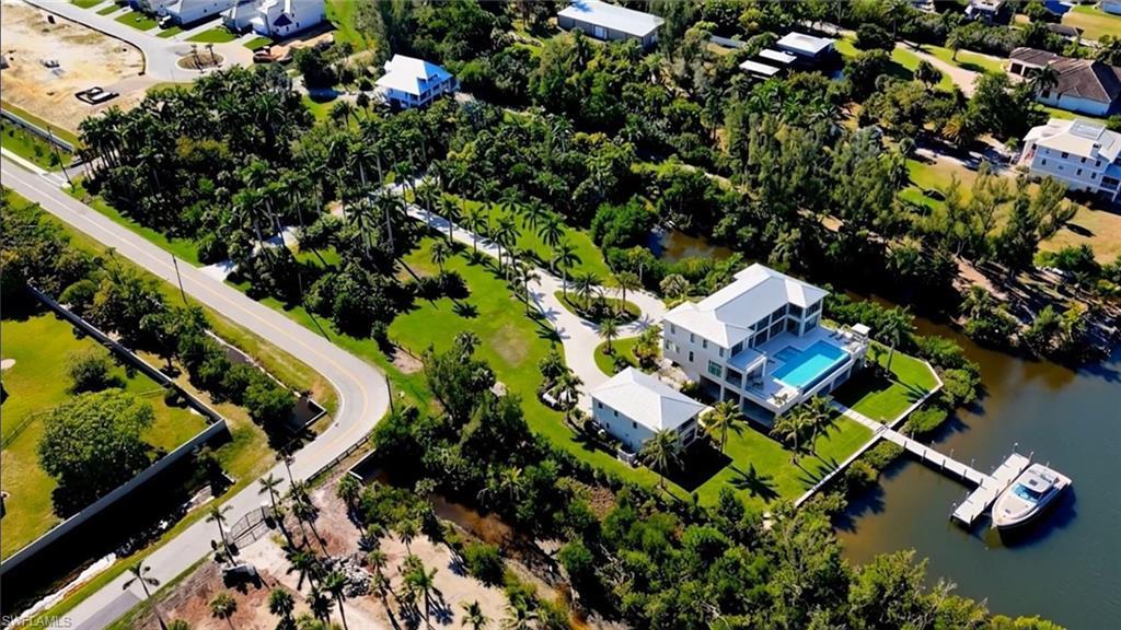 Image 4: This image is an AI-generated conceptual rendering and is not an accurate depiction of the property. Improvements shown may not reflect actual boundaries, setbacks, scale, or permitted uses. Buyer to independently verify all development potential.