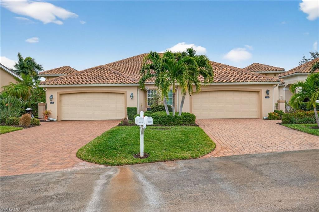 Image 3: Mediterranean / spanish house featuring stucco siding, decorative driveway, and a garage