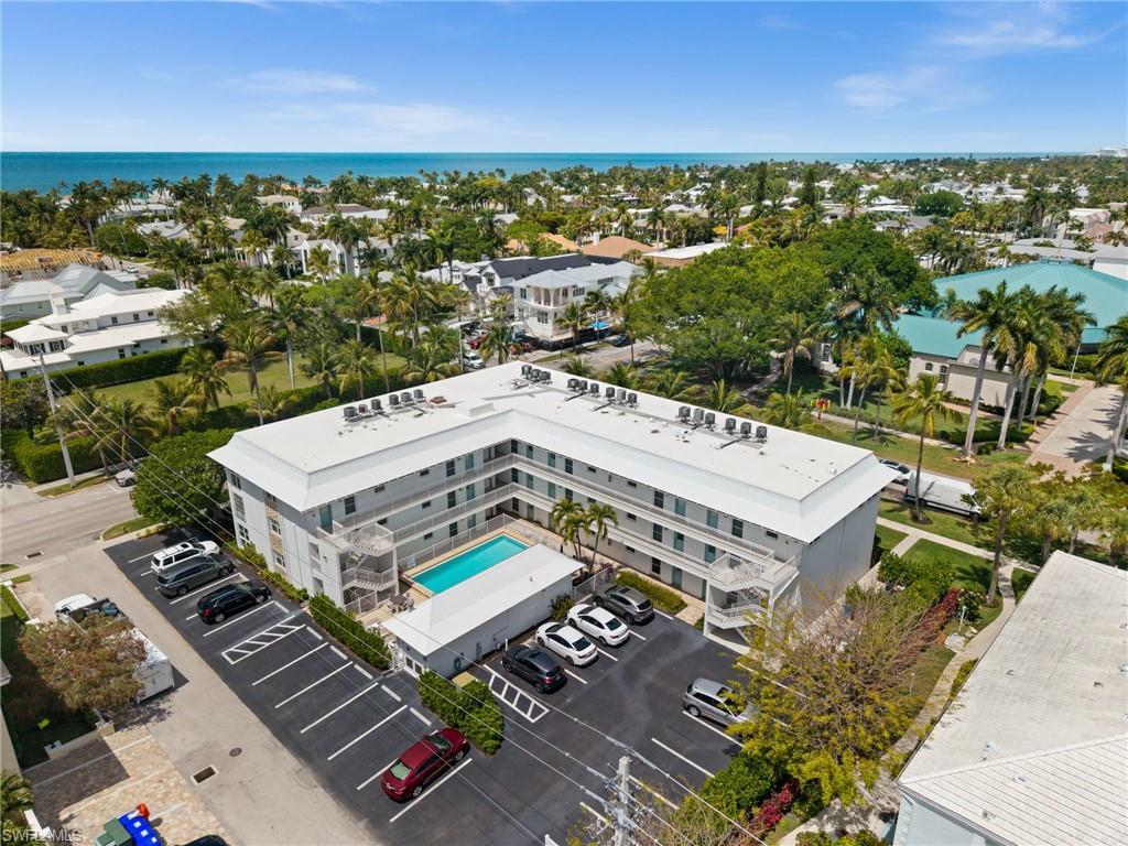 Image 4: Aerial of building with Gulf nearby