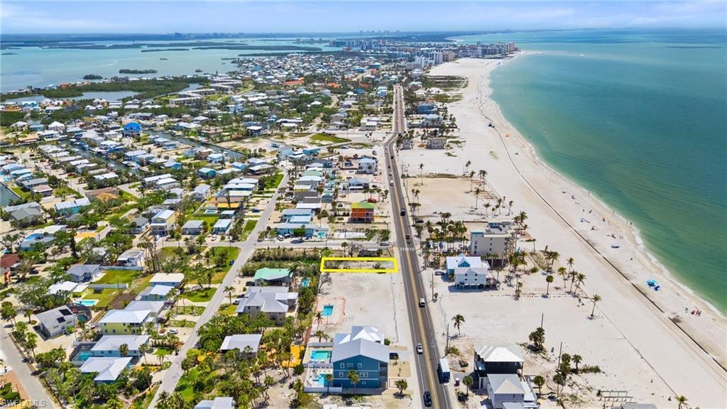 Image 4: Aerial view with a view of the beach and a water view  - Virtually Edited Image