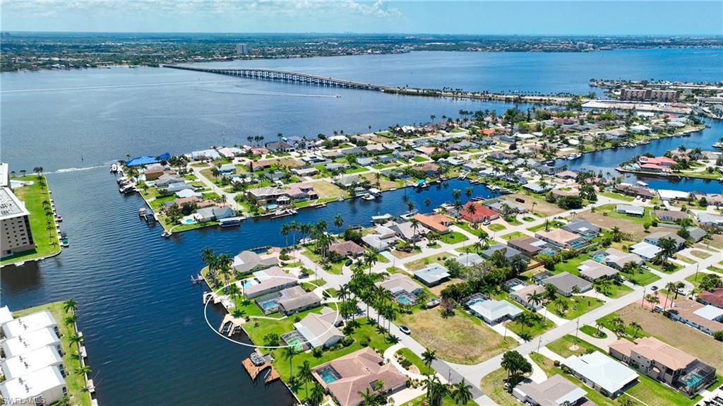 Image 1: Drone / aerial view with a water view