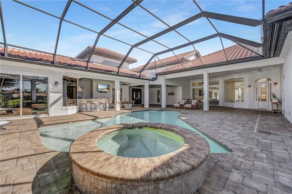 Image 4: Unwind in the custom pool and spa, the perfect retreat to relax and recharge after a day on the golf course.