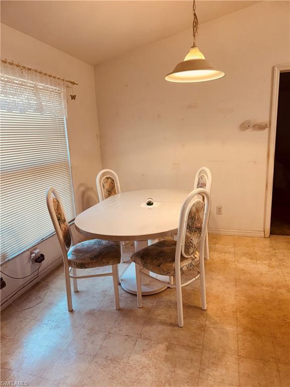 Image 3: Dining area featuring baseboards