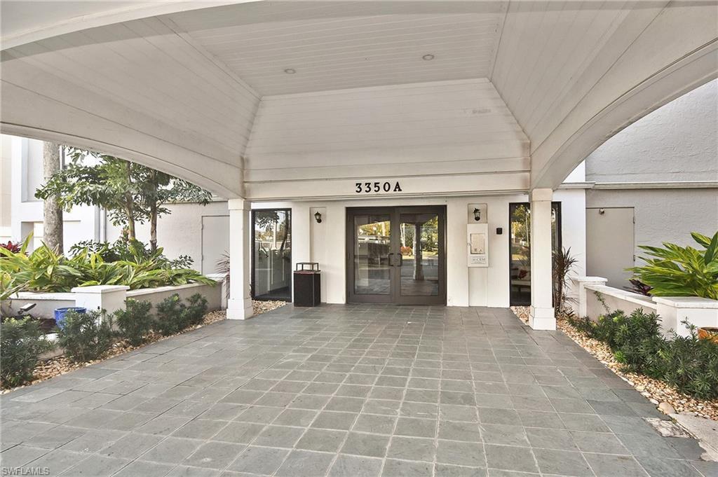 Image 3: Entrance to property with french doors and stucco siding
