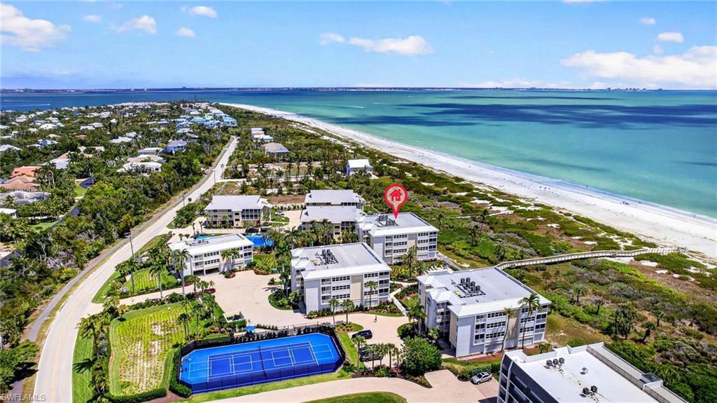 Image 2: This property is a beach-side residence with direct access to the white sand beach and the turquoise waters
