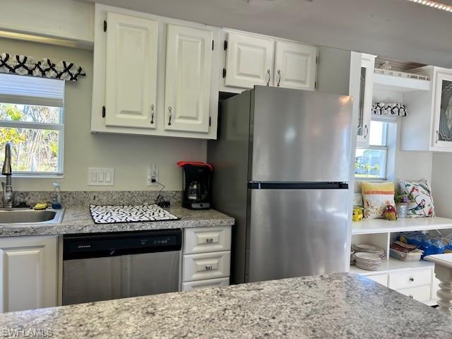 Image 2: STAINLESS STEEL DISHWASHER AND REFRIGERATOR