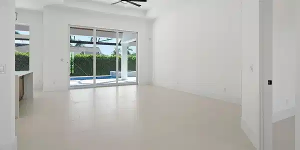 Image 4: Empty room featuring a tray ceiling, recessed lighting, a ceiling fan, and a sunroom