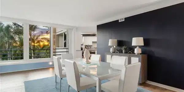 Image 2: Excellent split bedroom floor plan with 2 bedrooms plus a den that could easily be converted into a 3rd bedroom (already offers en-suite access to a full bath!)