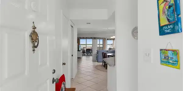 Image 3: Hallway featuring light tile patterned flooring