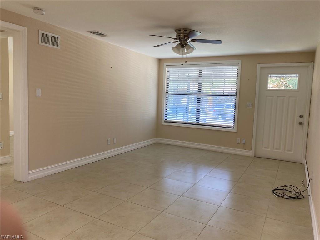 Image 2: Entrance foyer featuring ceiling fan and light tile patterned flooring