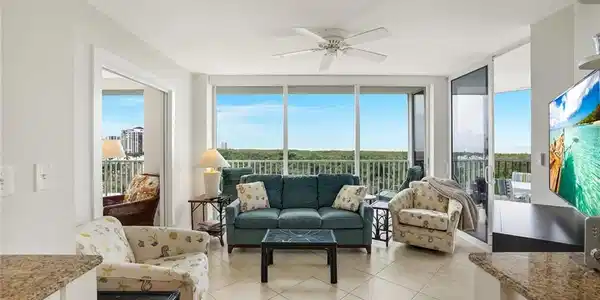 Image 2: Sunroom with tile patterned flooring and floor to ceiling windows