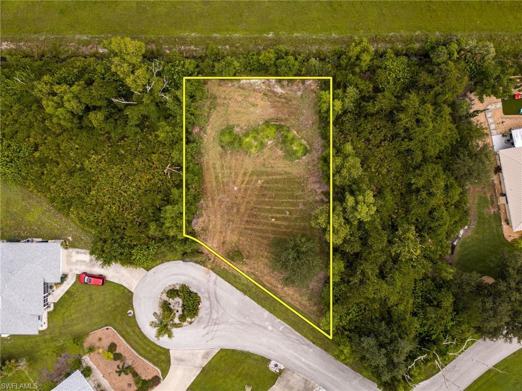 Image 4: Aerial overview of property's location featuring property parcel outlined