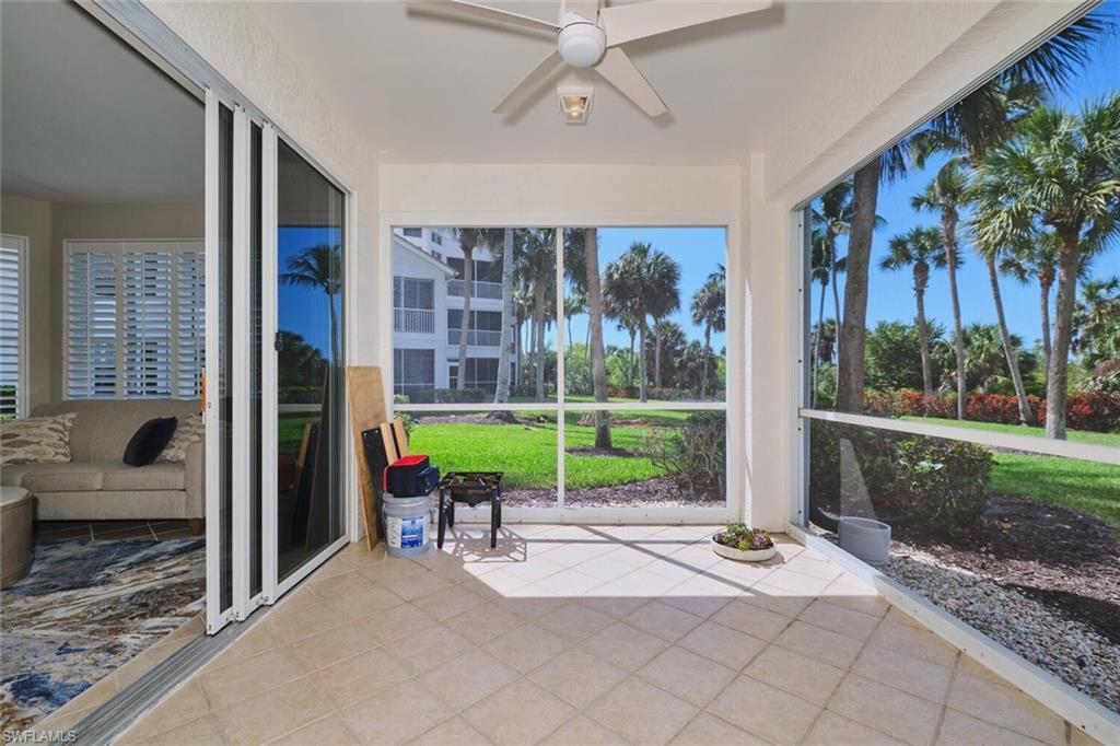Image 4: Unfurnished sunroom with a ceiling fan, tile patterned floors, and plenty of natural light