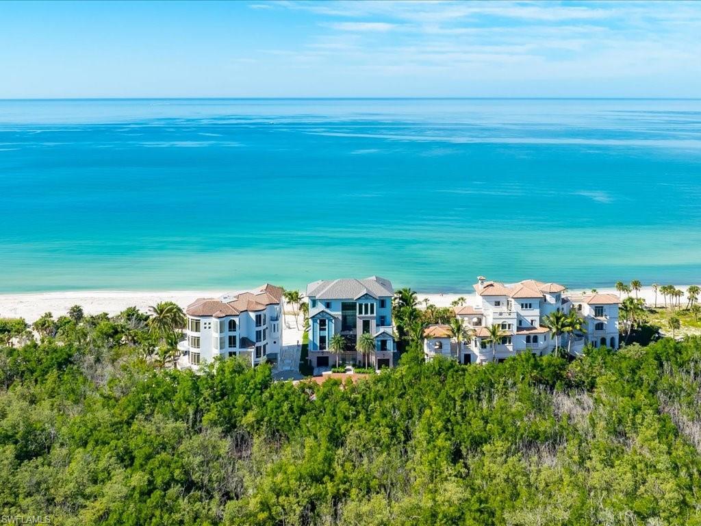Image 2: Drone / aerial view of waterfront with a beach