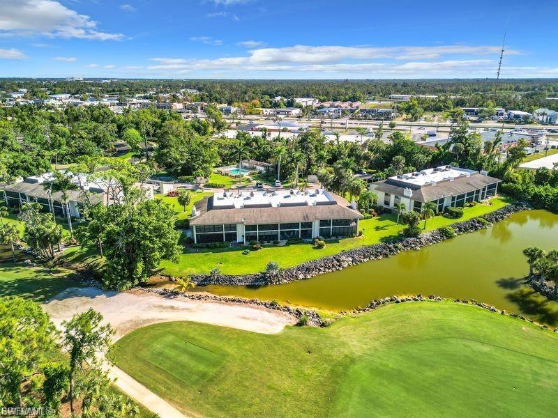 Image 4: Drone / aerial view of a golf course and a large body of water