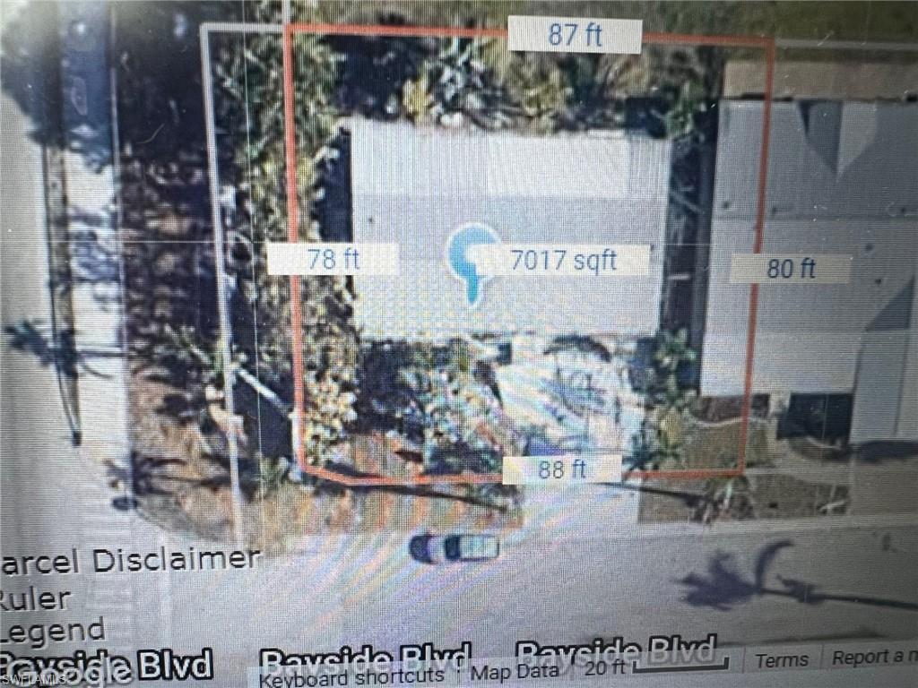 Image 2: Lot with home pre Ian