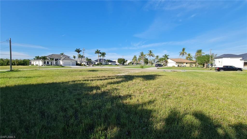 Image 4: View of yard featuring a residential view
