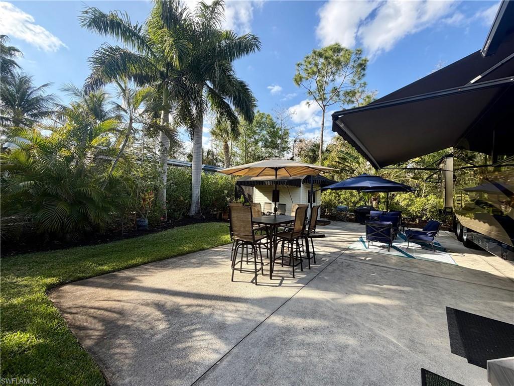 Image 3: View of patio with outdoor dining area
