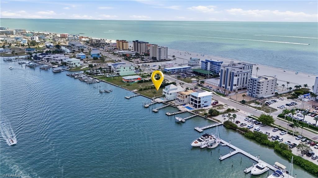 Image 3: View of urban area with a large body of water - Virtually Edited Image