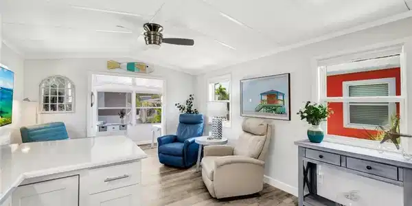 Image 4: Notice the vaulted ceiling and luxury vinyl flooring throughout....