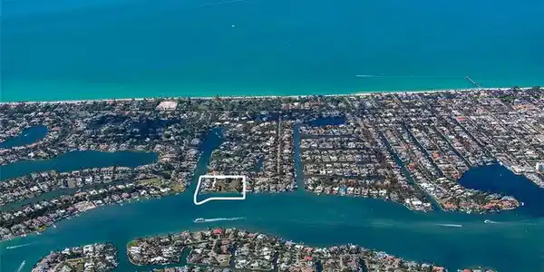 Image 3: Aerial View of Naples Bay and the Gulf.