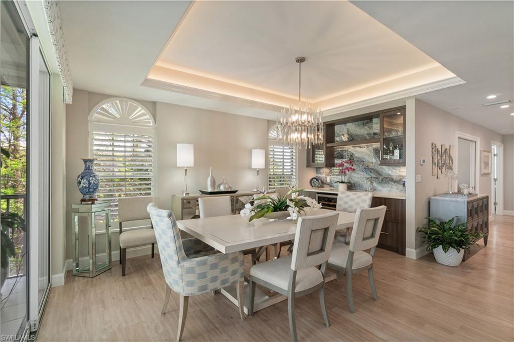 Image 4: Dining area with wet bar and wine cooler