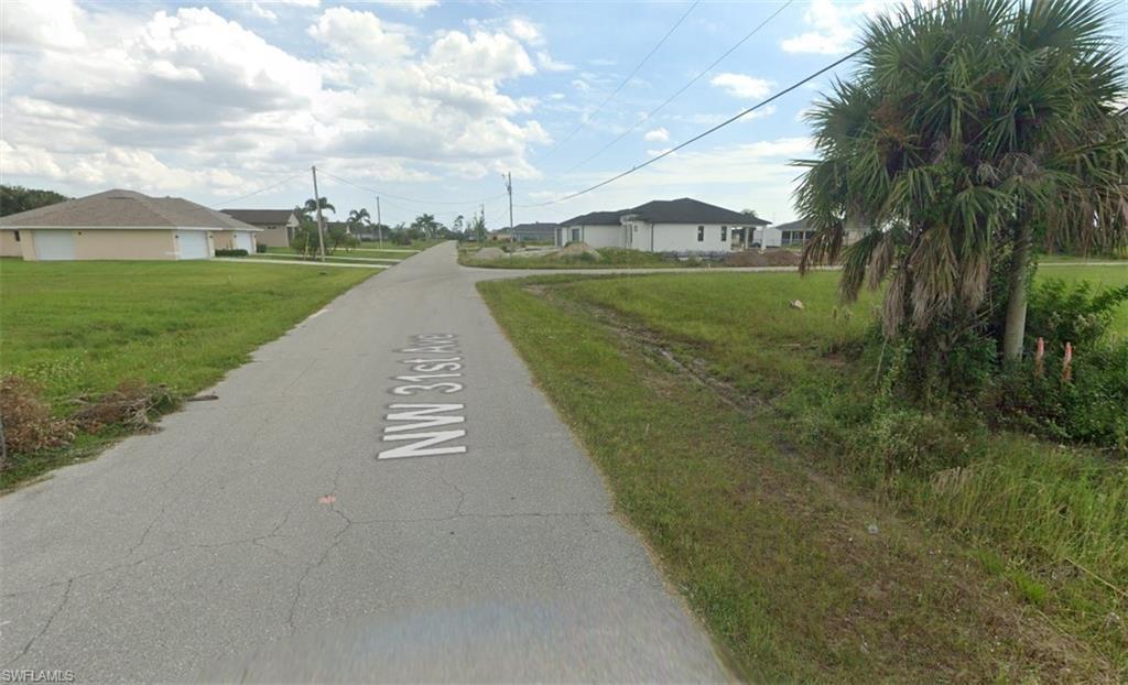 Image 2: View of asphalt street