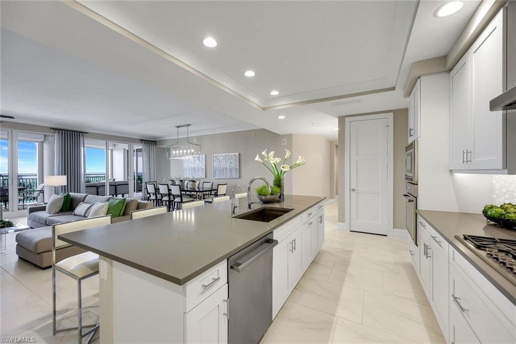Image 1: Kitchen opens directly to the great room and dining area &mdash; making hosting friends and family an absolute breeze.