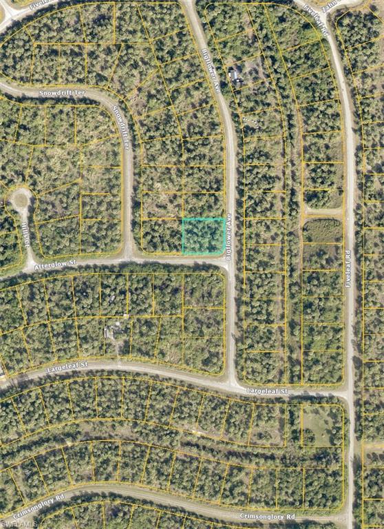 Image 1: Aerial view of property's location featuring property boundaries highlighted