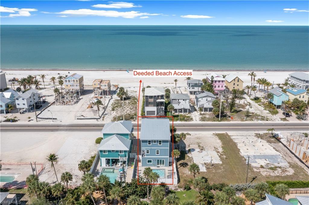 Image 2: Direct beach access, a private swimming pool, and a multi-story design