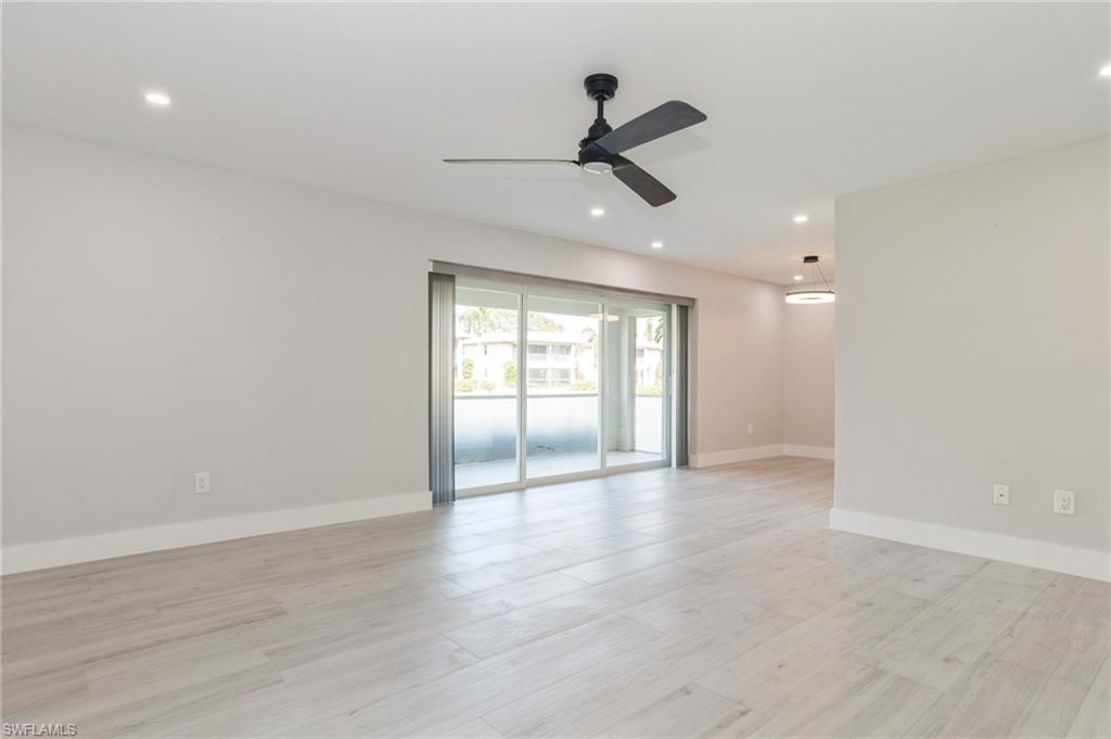 Image 3: Empty room with a ceiling fan, light wood-style floors, and recessed lighting