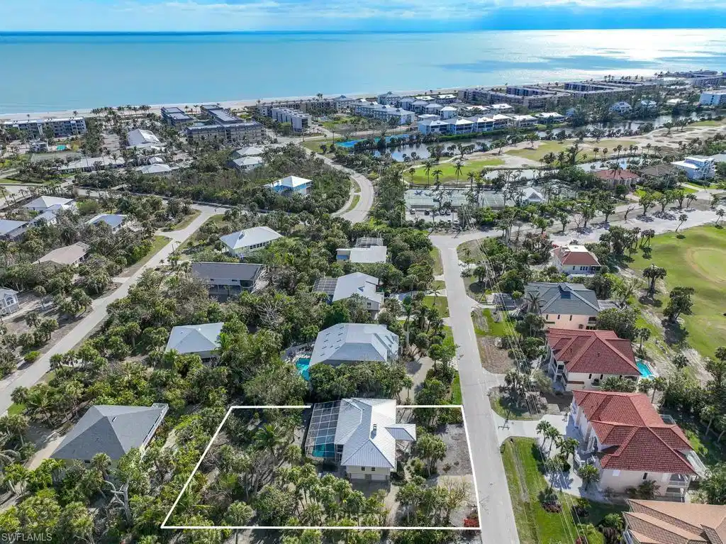 Image 1: Drone / aerial view featuring a water view