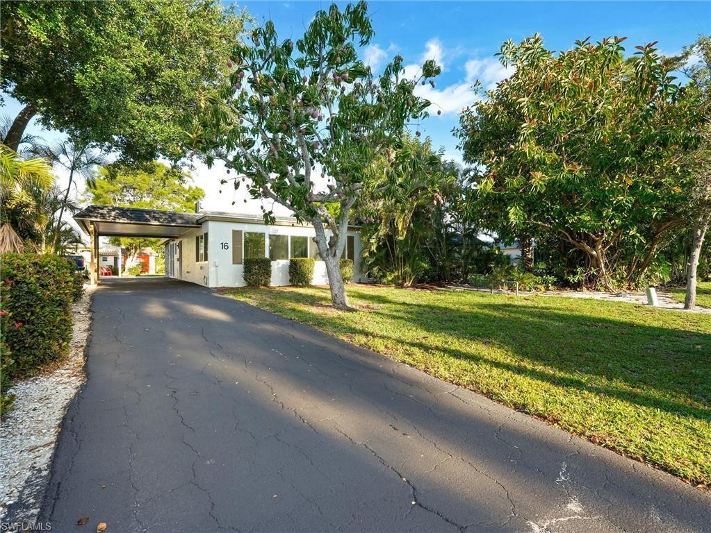 Image 1: Palm Street driveway entrance