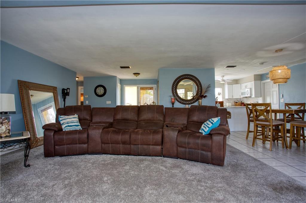 Image 4: View of carpeted living room