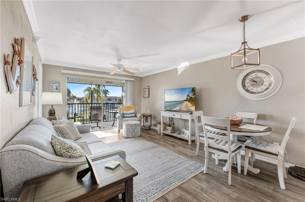 Image 2: Fabulous views of the lake and fountain from your living area.  Beautiful luxury vinyl floors.