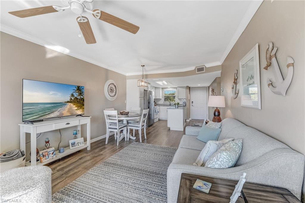Image 4: The open-concept layout is perfect for both relaxing and entertaining.