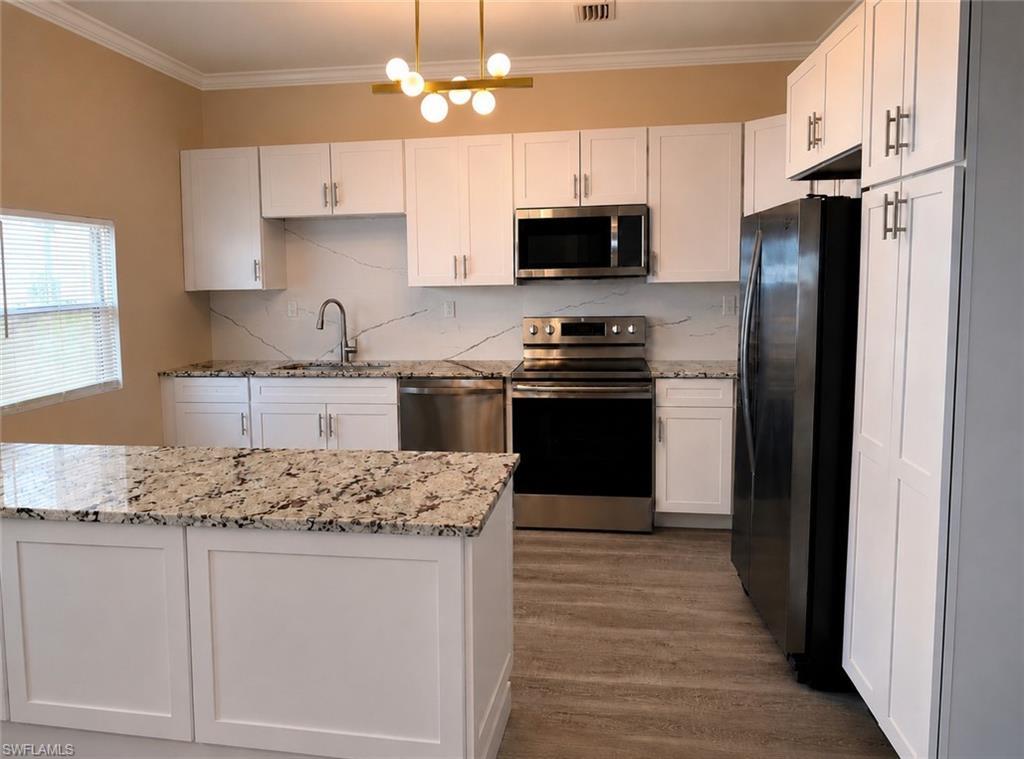 Image 4: Quartz countertops to be installed before closing