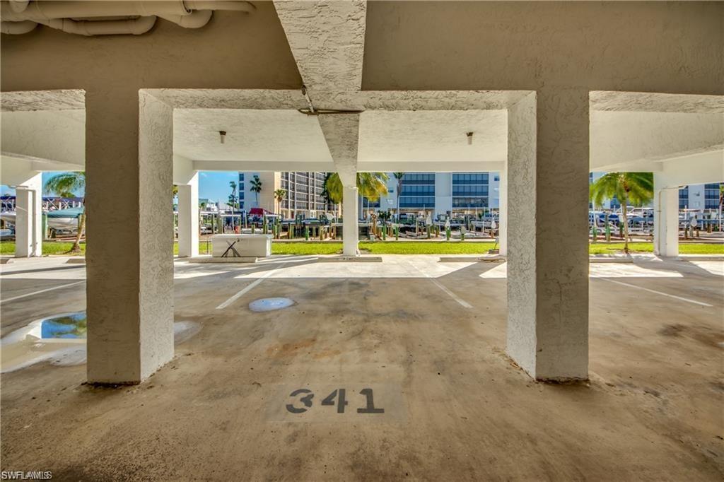 Image 4: Coveted underneath parking. Otherwise you are outside in the hot sun!