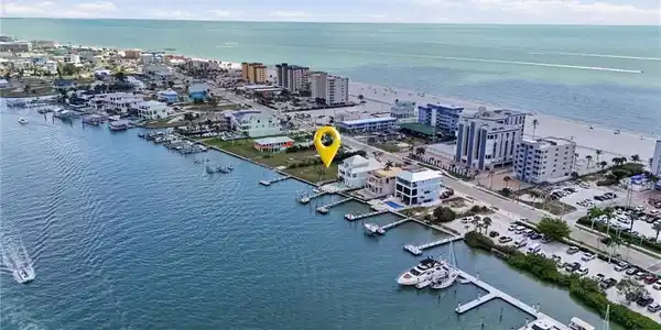 Image 3: View of urban area with a large body of water - Virtually Edited Image